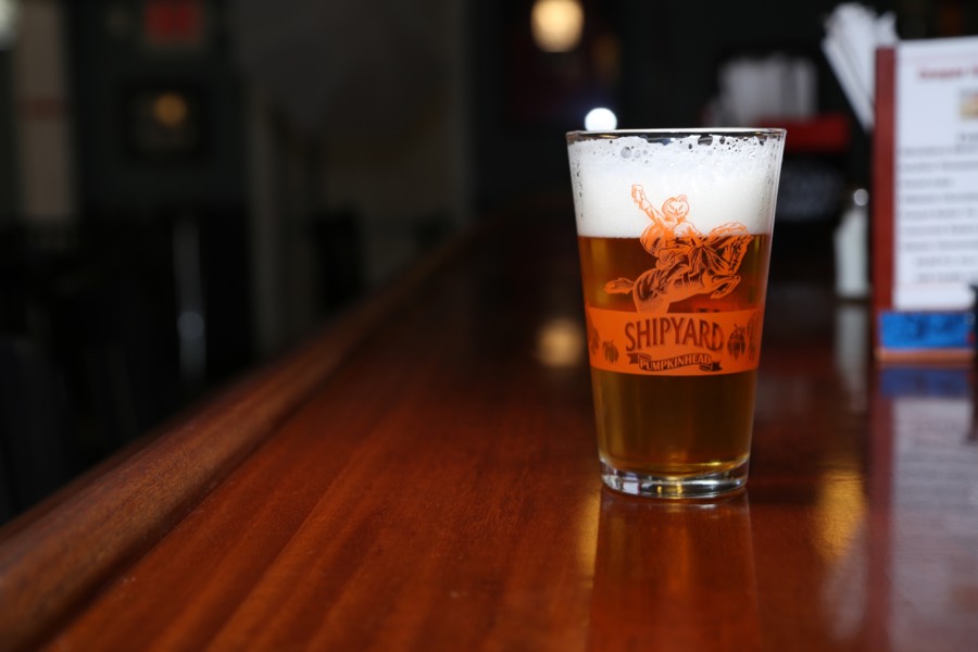 A seasonal pumpkin ale on the bar